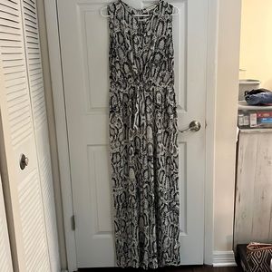Snakeskin print romper with long sheer leg